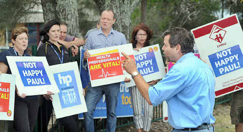 Union organiser Ron Fossen rallies health practitioners at Hervey Bay Hospital yesterday. Union organiser Ron Fossen rallies health practitioners at Hervey Bay Hospital yesterday.